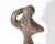A 1972 sculpture of a nude figure produced by Austin Productions. This sculpture is an abstract form of a nude woman,...