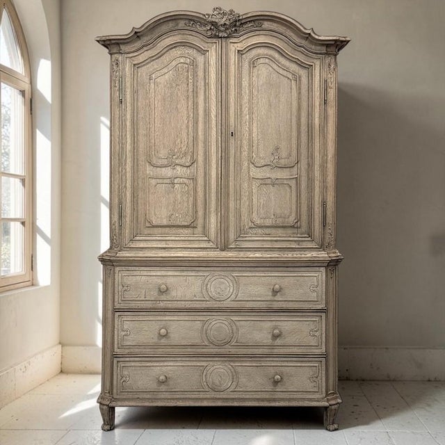 Created in Liège, Belgium, during the 18th century, this exceptional antique linen press represents the celebrated...