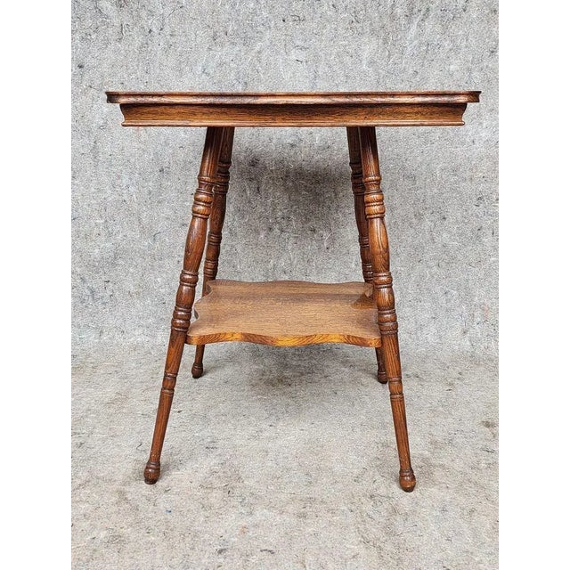 Magnificent vintage, Mid 20th Century Fern/Parlor Table. Double tiered with bobbin legs and exquisite detailing. Excellent...