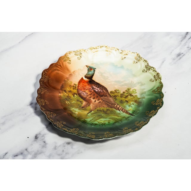 Bring the charm of the English countryside into your home with this beautiful circa 1910 Bavarian porcelain cabinet plate,...