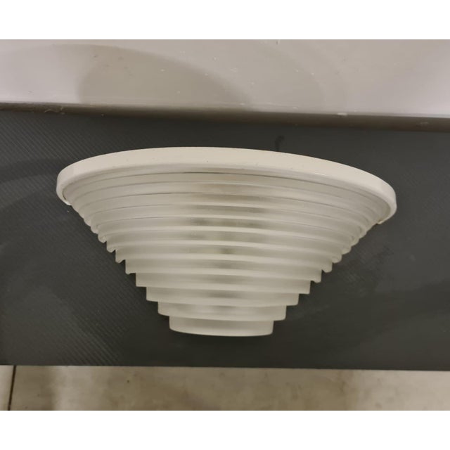 Egisto 38 model wall sconce by Angelo Mangiarotti for Artemide. Wall lamp from the Egisto series, here in its larger...