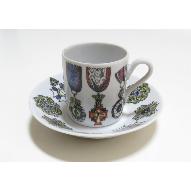 Rare 1960's Fornasetti Art/Design on Richard Ginori Fine Porcelain - Al Merito Cup and Saucer PIERO FORNASETTI "Al...