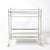 This handsome mid-century modernist two-tier bar cart, crafted in America during the 20th century, is the perfect blend of...