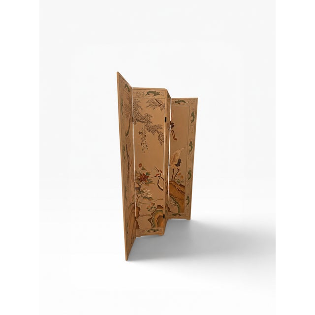 A striking vintage 4-panel Asian folding screen featuring a richly detailed scene of cranes, weeping willow trees, and...