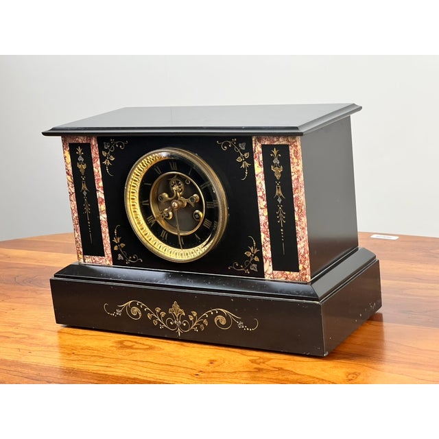 This antique Victorian mantle clock has a wonderfully sophisticated appearance, combining the bold architectural look of...