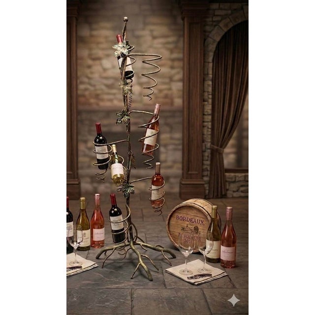 A striking and highly sculptural vintage wrought-iron grapevine wine rack, standing an impressive 51 inches tall. Designed...