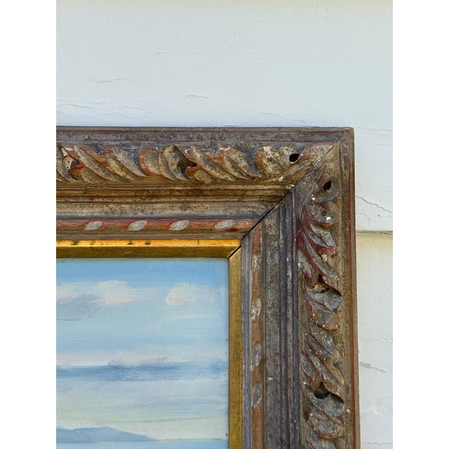 Original mid-century coastal seascape painting executed in oil on canvas, depicting a rocky shoreline with crashing waves...