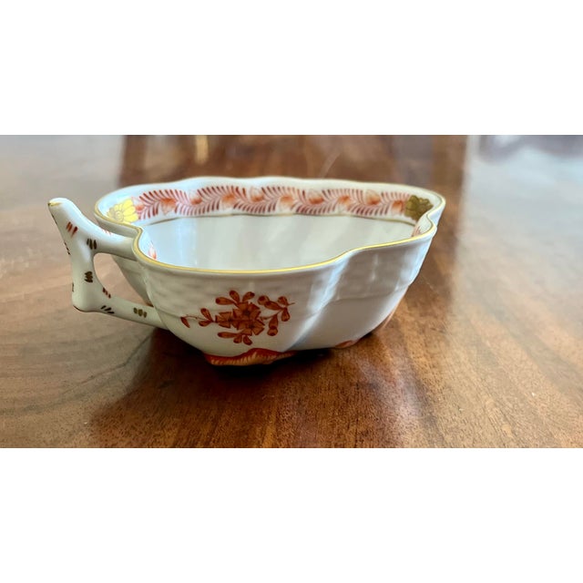 Herend hand painted porcelain imported from Hungary. Rust color palette with 24 karat gold trim. Condiment or nut bowl in...