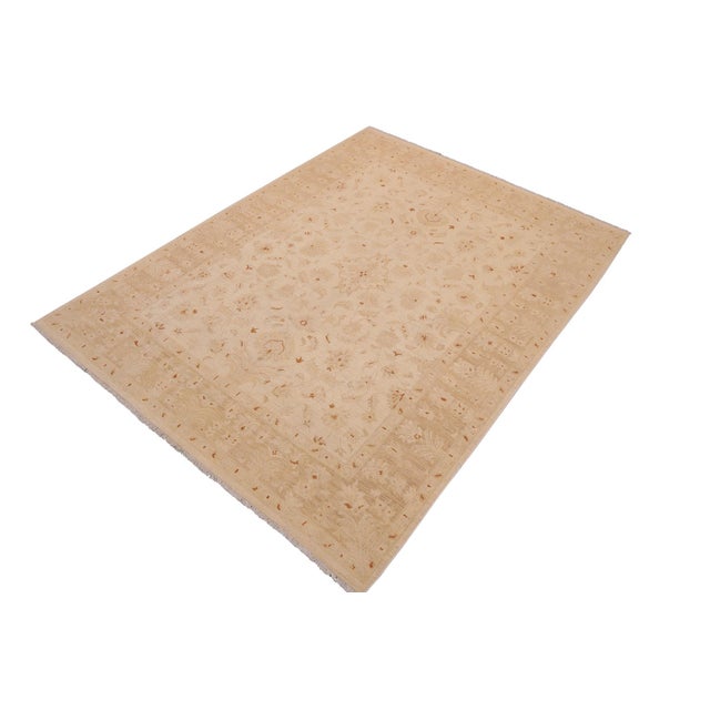 "Enhance the ambiance of your home with this magnificent Persian-influenced Turkish hand-knotted rug made by skilled...