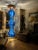 Beautiful blue capiz shell three tier chandelier The shells are suspended from a wood base and overall measures 16" x 16"...