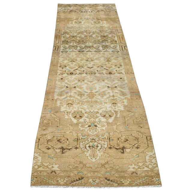 Hand-knotted with care using traditional rug making techniques, this wool rug blends timeless craftsmanship with a modern...