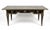 This elegant piece is a classic French Louis XVI style ebonized bureau plat (writing table), known for its clean...