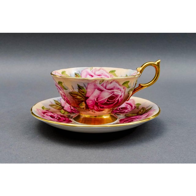 Anysley England 13 Pink Cabbage Roses 1026 Bone China Tea Cup & Saucer Set. Measures approximately: Cup: 5" long, 3 7/8"...