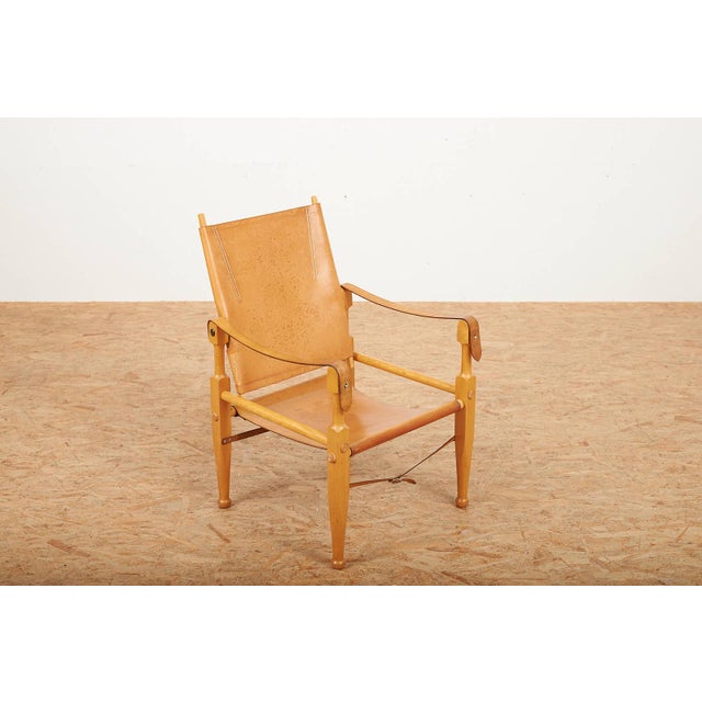 Colonial Armchair with Beechwood Frame and Leather Upholstery by Wilhelm Kienzle for Wohnbedarf, 1928, in Good conditions....