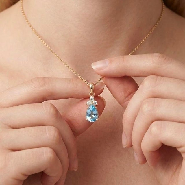 Capture the essence of serene elegance with this exquisite gemstone pendant, beautifully. Designed for the modern woman...