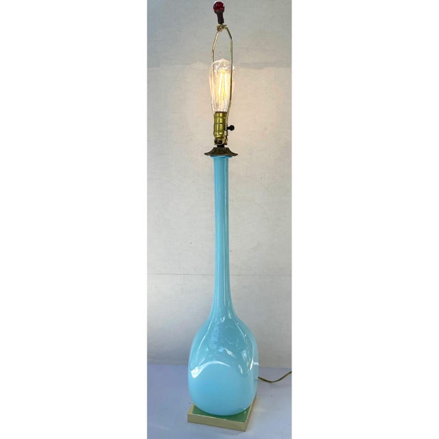 Beautiful circa-1960s robin’s-egg-blue Murano glass lamp body assembled with new metal base, socket, and wiring. Takes one...