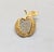 1950s goldtone textured apple with leaf with a bite taken out of it, with the inside of the apple comprised of pavé round...