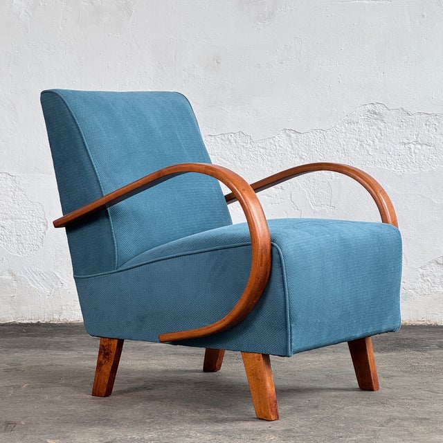 This pair of lounge chairs is based on the iconic type h-410 design by the celebrated czech designer jindrich halabala,...