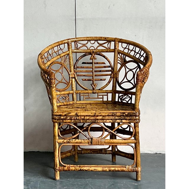 Capture the exotic elegance of the English Regency with this stunning vintage Brighton Pavilion-style chair. Masterfully...