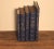 Recycled books from assorted authors professionally rebound in leather. Color similar to Gentleman's Gray. Each set of...