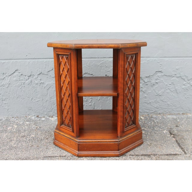 A beautiful burl amboyna petite occasional table. Carved beautifully.