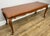 A beautifully styled Vintage French Louis coffee table , featuring elegant curves and decorative carved detailing that...