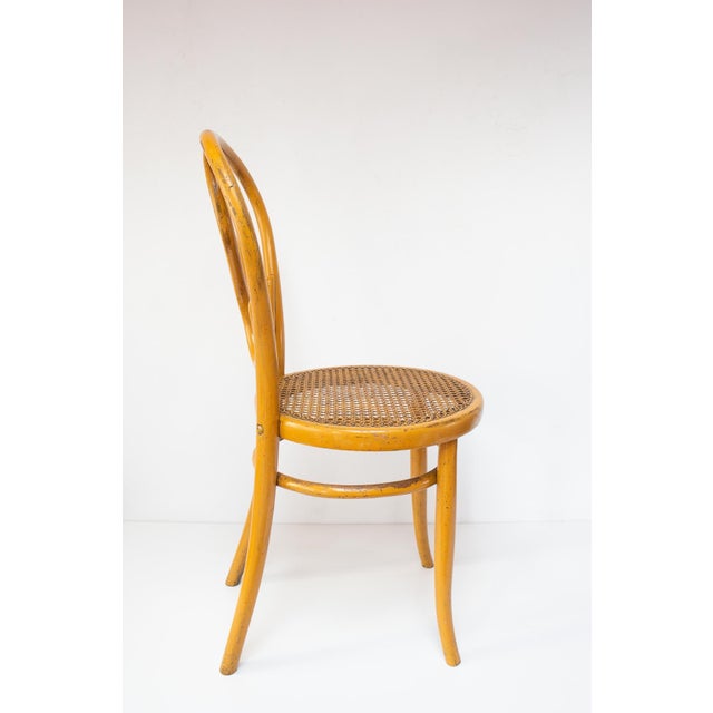 One chair keeps the original label. Both are identical.