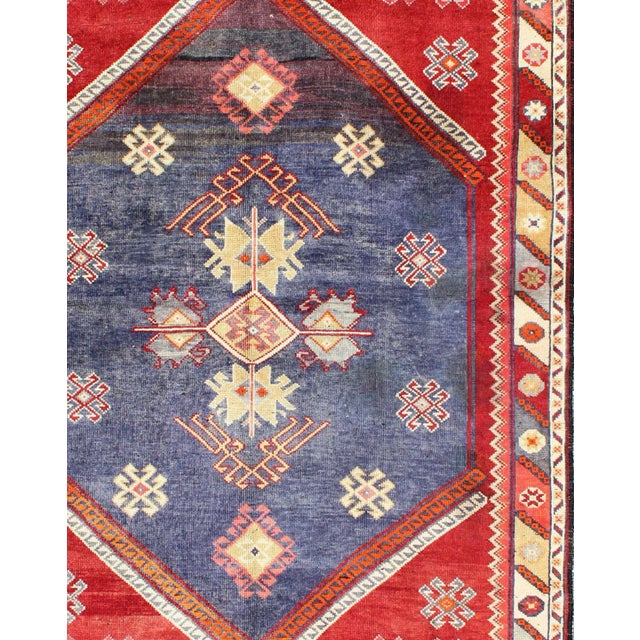Keivan Woven Arts, kwarugs /Osm-25, This vintage Oushak rug features an intricately beautiful design. The central...