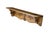 Antique hand-carved wooden wall shelf crafted from solid golden oak with a clear, prominent grain texture. It features a...