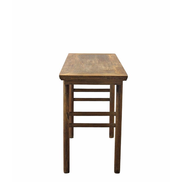 Retrieved from the Shanxi province of China, this table features a rectangular panel top with a simple and elegant...