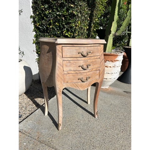 Pair of Three-drawer chests featuring a shaped and slightly bowed front with a serpentine apron and cabriole legs....