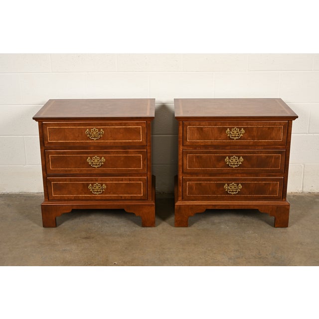 An exceptional pair of Georgian or Chippendale style three-drawer nightstands or bachelor chest By E. J. Victor USA, Circa...