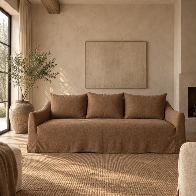 Meet the Lyon Sofa —a relaxed, timeless piece designed to bring warmth and effortless comfort into your home.Slip covered...