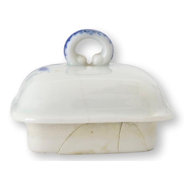 Japanese Meiji period porcelain tea service featuring elegant cobalt blue bamboo decoration on crisp white porcelain. The...