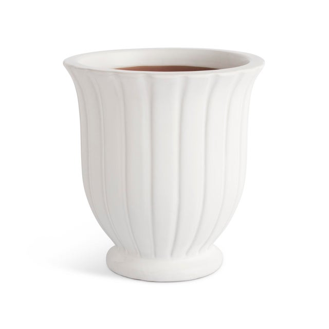 This durable earthenware pot is designed for the outdoors, but is equally as beautiful indoors. From the depth of the...