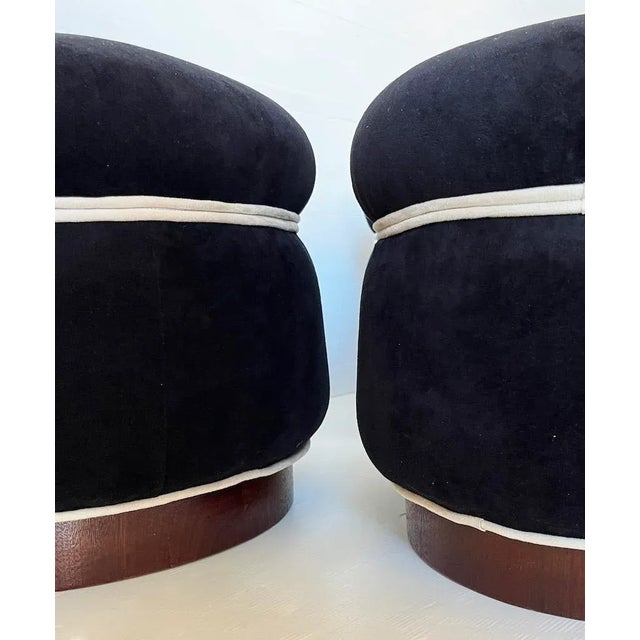 Particular round deco poufs with walnut wood structure and seat covered with black velvet and white cord detail. Period:...
