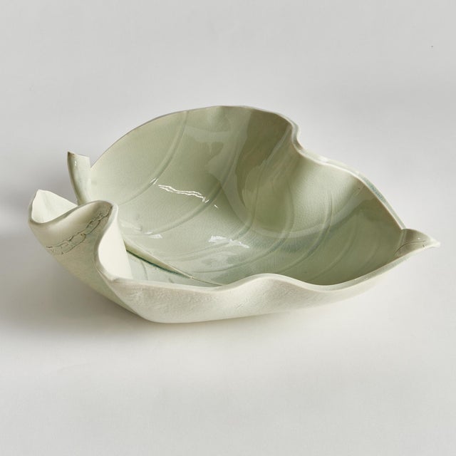 Each and every distinctive detail of the Moricento Leaf Sculpture is handsculpted by Italian artisans in Tuscany. A...