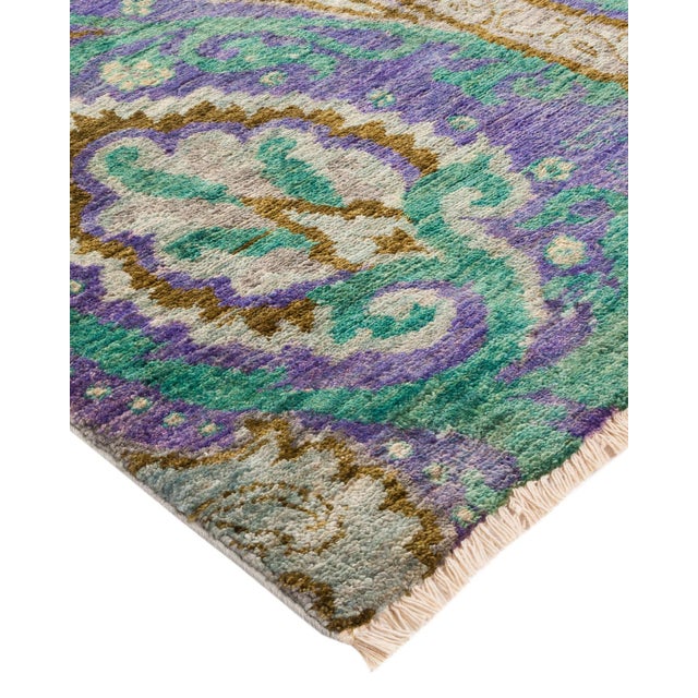 Color: Blue Multi. Made In: Pakistan. 100% Wool. The meticulous art of hand-embroidered textiles from Uzbekistan tribes...