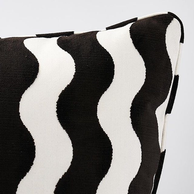 This pillow features The Wave by Miles Redd (Item# 69420, THE WAVE VELVET FABRIC) for Schumacher with a self-welt finish....