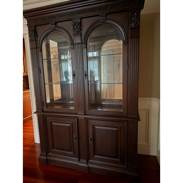 Gorgeous China Cabinet by Bernhardt furniture. 2 upper cabinet doors with mirrored inserts and two glass shelves each to...