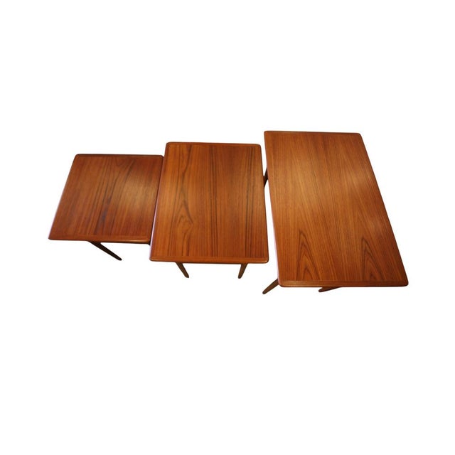 An incredibly beautiful and elegant teak set table, designed by Poul Hundevad for Fabian in Denmark. The set consists of...