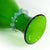 This decorative wine or water carafe is made of body-tinted glass in a beautiful emerald green. Decorated with a delicate...