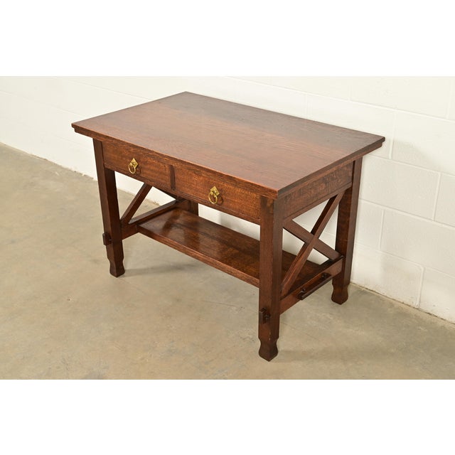 A gorgeous antique Mission or Arts & Crafts period writing desk or library table In the manner of Stickley Brothers USA,...