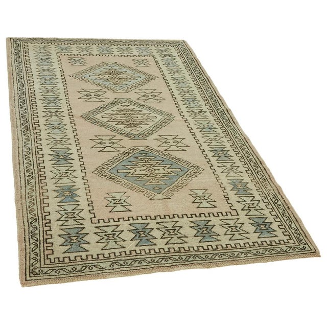 This Turkish handmade Anatolian rug is a timeless piece of craftsmanship, created in the heart of Anatolia, Turkey, a...