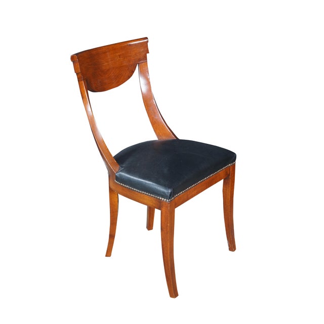 Five vintage Italian Fiorini Klismos side dining chairs. Made of solid cherry featuring Biedermeier and Regency styling...