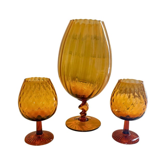 Vintage collection of mid-century modern amber Empoli art glass pieces, in the form of oversized to giant brandy snifter...