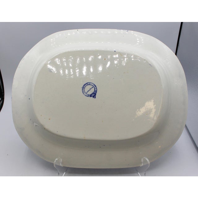 Circa 1859-1884 Blue Willow pattern platter by J.T. Hudden, England. Fine earthenware in one of J.T. Hudden's (John...