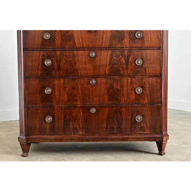 A gorgeous 19th century Dutch mahogany chest of drawers--seven drawers to be exact--like a rather large semainier with...