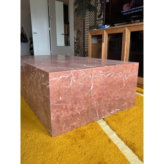Gorgeous coral red marble table, retails for over $3k. Chic statement piece that’s sure to add architectural interest to...