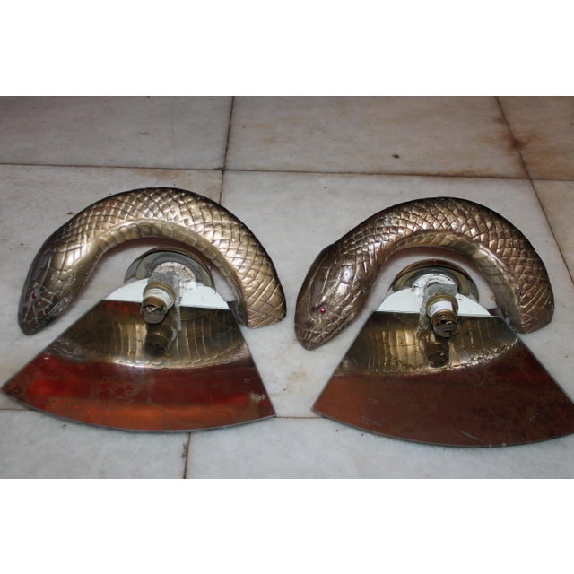 1960's Pair British Designer Mid Century Modern Bronze Python Wall Sconces. Mirror backed and signed Wilson Laidlaw. This...